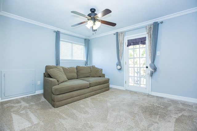 550 Briarwood Dr, Southlake, TX 76092 - living area with ornamental molding, a ceiling fan, healthy amount of natural light, and carpet floors