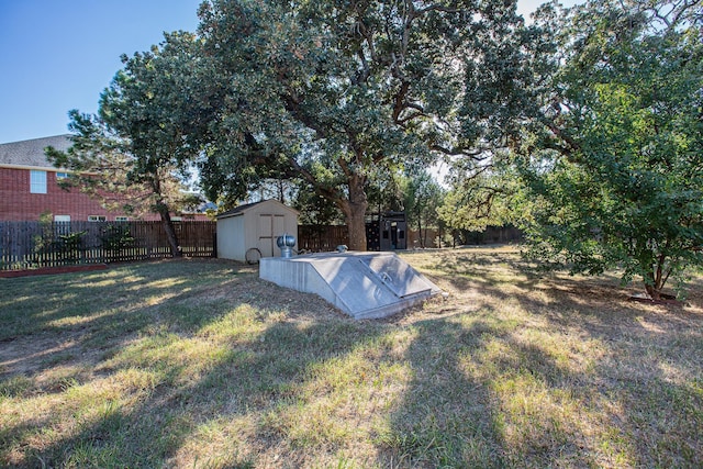 550 Briarwood Dr, Southlake, TX 76092 - fenced backyard featuring a storage unit