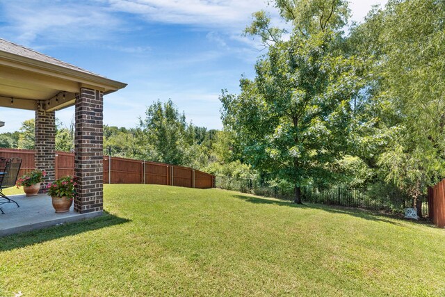 1104 Cheyenne Dr, Aubrey, TX 76227 - fenced backyard featuring a patio