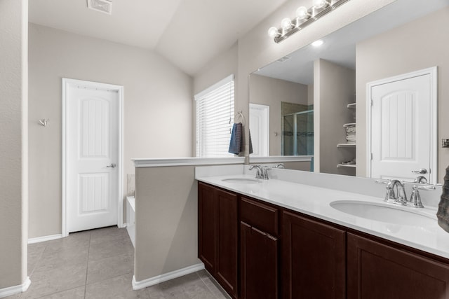 1104 Cheyenne Dr, Aubrey, TX 76227 - bathroom with a stall shower, double vanity, a bath, lofted ceiling, and tile patterned flooring