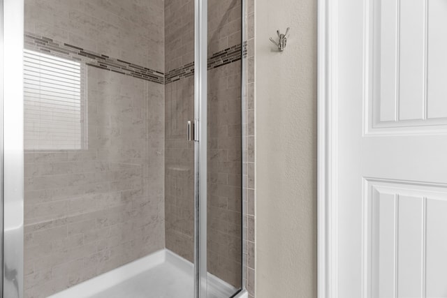1104 Cheyenne Dr, Aubrey, TX 76227 - full bathroom with a stall shower and a textured wall