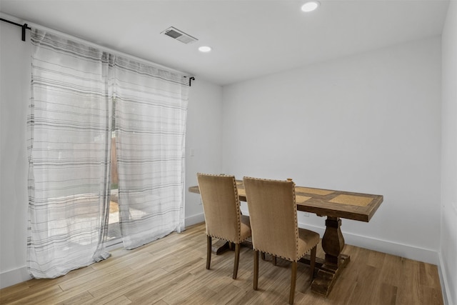 2304 Spanish Trl, Irving, TX 75060 - dining area featuring light wood finished floors and recessed lighting