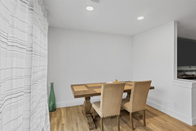 2304 Spanish Trl, Irving, TX 75060 - dining space with wood finished floors and recessed lighting