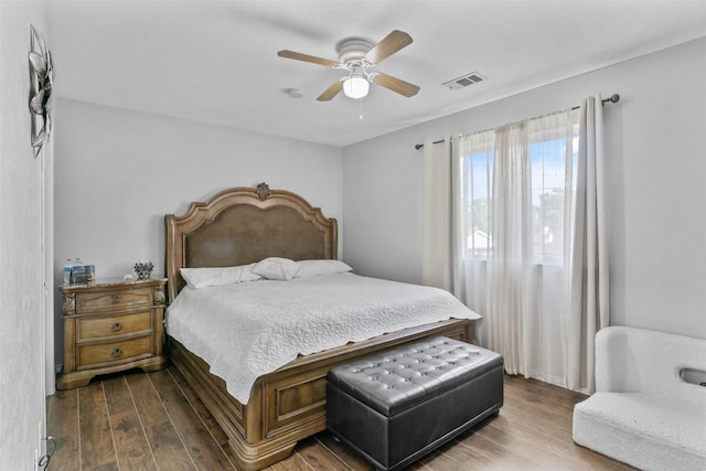 2304 Spanish Trl, Irving, TX 75060 - bedroom with wood finished floors and ceiling fan