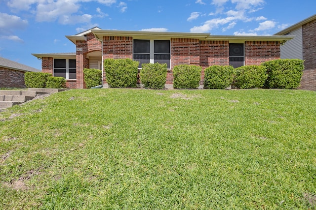 1428 Nimitz Way, Mesquite, TX 75181 - view of front of house with brick siding and a front yard