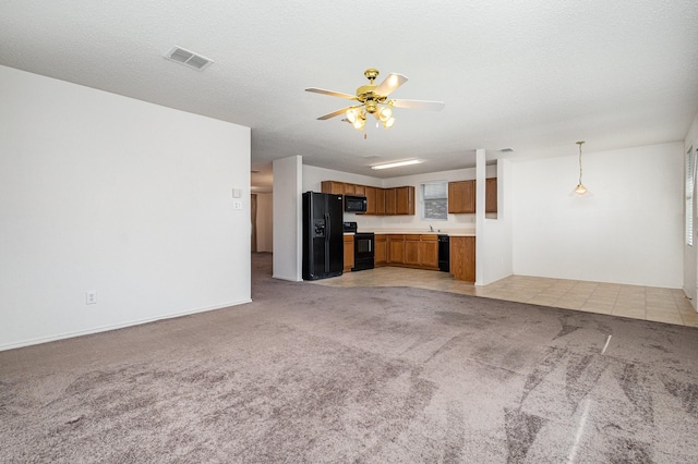 1428 Nimitz Way, Mesquite, TX 75181 - unfurnished living room featuring light carpet and ceiling fan