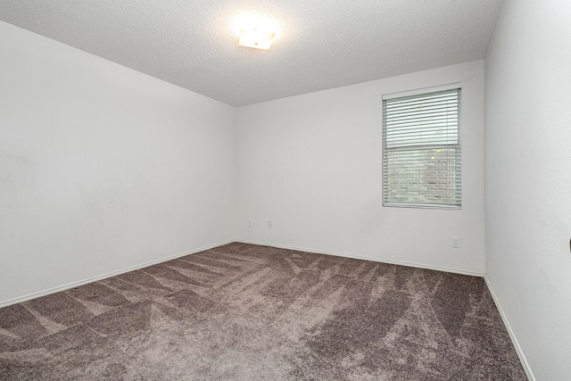 1428 Nimitz Way, Mesquite, TX 75181 - unfurnished room featuring carpet floors and a textured ceiling