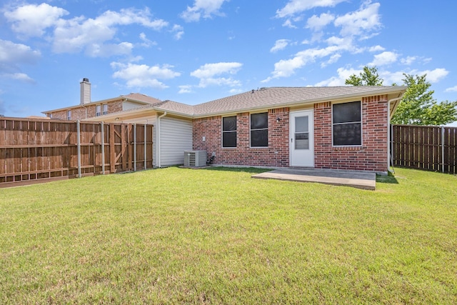1428 Nimitz Way, Mesquite, TX 75181 - back of property with brick siding, a fenced backyard, and a patio