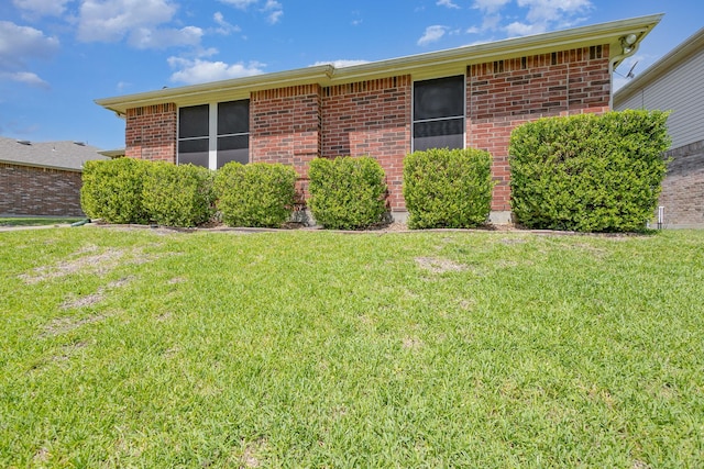 1428 Nimitz Way, Mesquite, TX 75181 - view of side of property featuring a yard and brick siding
