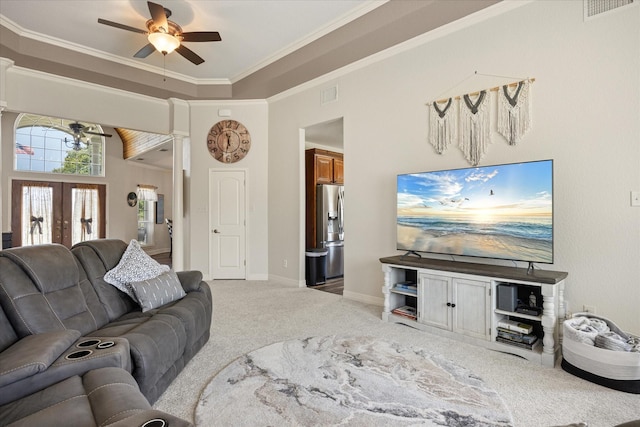 2030 Hills Ct, Stephenville, TX 76401 - carpeted living area featuring a ceiling fan, french doors, and crown molding