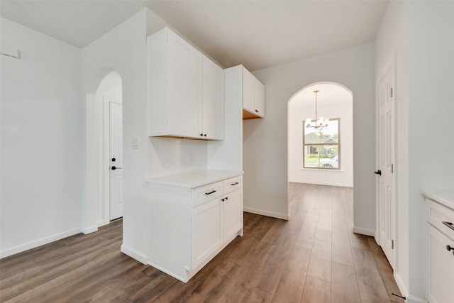 13625 Musselshell Dr, Ponder, TX 76259 - kitchen featuring arched walkways, light countertops, and wood finished floors