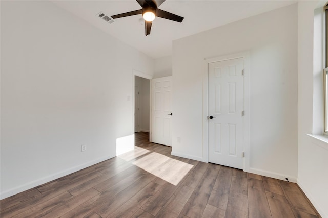 13625 Musselshell Dr, Ponder, TX 76259 - unfurnished bedroom with wood finished floors and ceiling fan