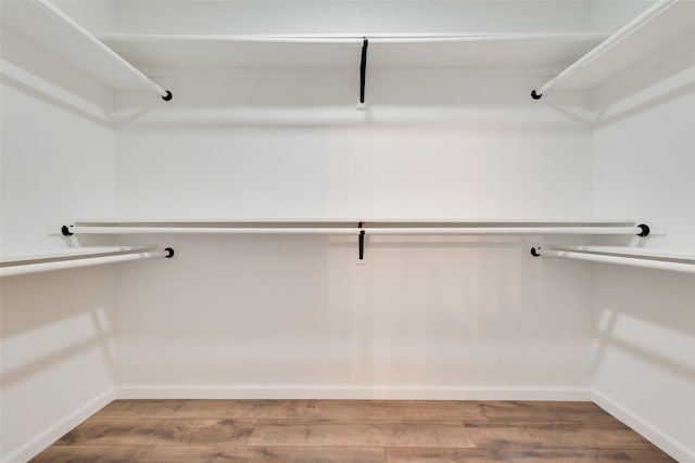 13625 Musselshell Dr, Ponder, TX 76259 - walk in closet featuring wood finished floors