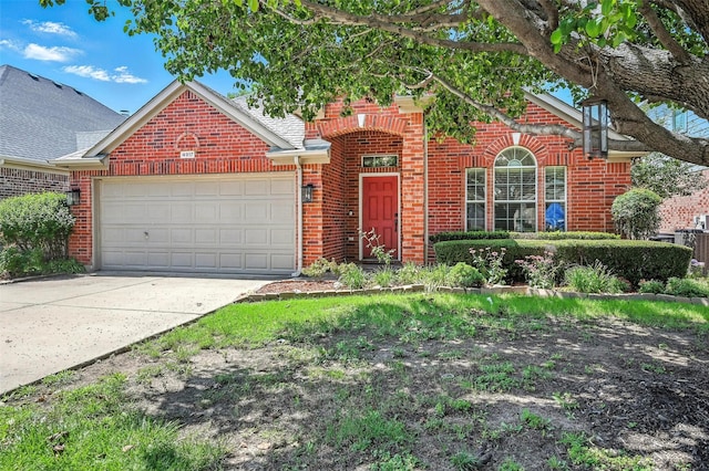 4917 Summer Oaks Ln, Fort Worth, TX 76123 - traditional-style home with brick siding, a garage, and concrete driveway