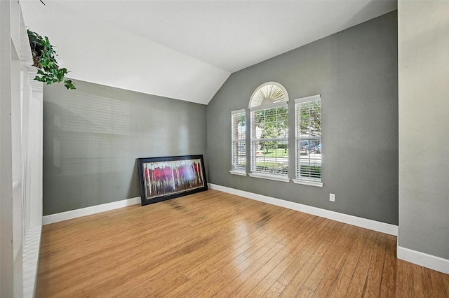 4917 Summer Oaks Ln, Fort Worth, TX 76123 - unfurnished living room featuring vaulted ceiling and light wood-style flooring