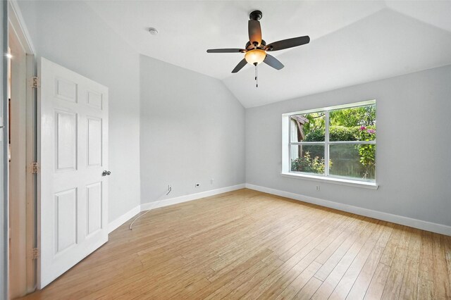 4917 Summer Oaks Ln, Fort Worth, TX 76123 - spare room featuring lofted ceiling, light wood-style floors, and ceiling fan