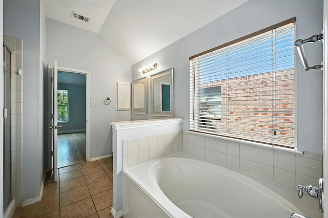 4917 Summer Oaks Ln, Fort Worth, TX 76123 - full bath featuring a bath, tile patterned flooring, and lofted ceiling