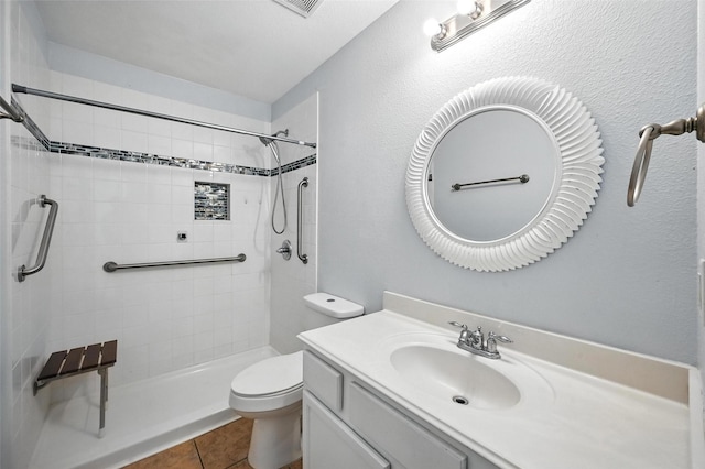 4917 Summer Oaks Ln, Fort Worth, TX 76123 - bathroom with vanity, a tile shower, and tile patterned flooring