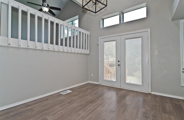 4300 Hidden Creek Dr, Arlington, TX 76016 - entryway with wood finished floors, french doors, ceiling fan, a high ceiling, and a chandelier