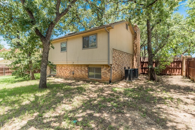 4300 Hidden Creek Dr, Arlington, TX 76016 - back of house with brick siding and a fenced backyard
