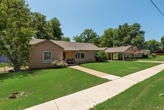 206 E Park, Italy, TX 76651 - single story home featuring a front lawn and a carport