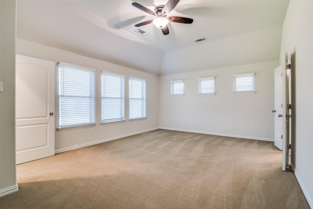 1304 Meridian Dr, Forney, TX 75126 - spare room featuring light colored carpet, a ceiling fan, and vaulted ceiling