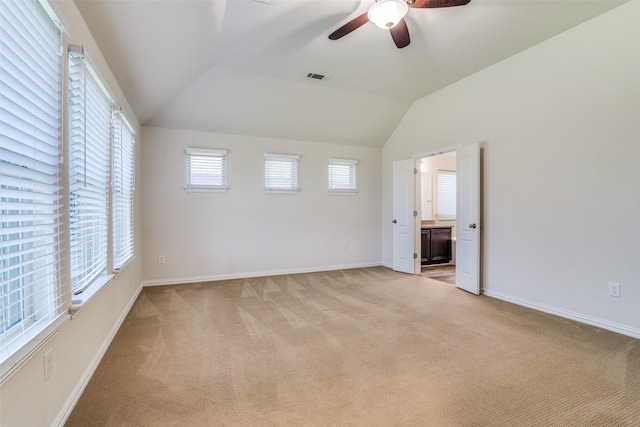 1304 Meridian Dr, Forney, TX 75126 - unfurnished room with a ceiling fan, light carpet, and vaulted ceiling