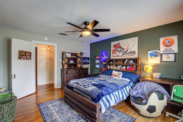 929 Church St, Sulphur Springs, TX 75482 - bedroom with wood finished floors and a ceiling fan