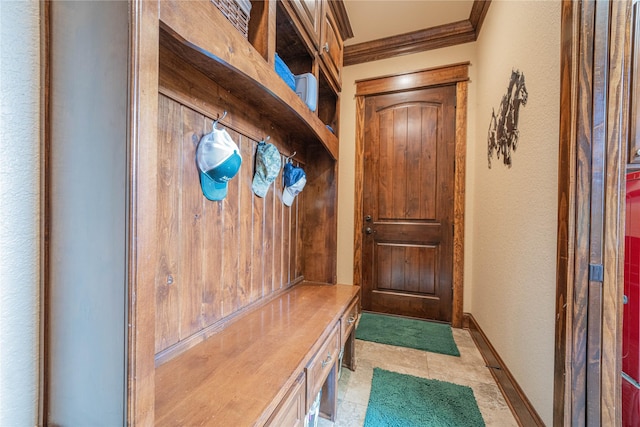 4555 Farm Rd Unit 1402, Mount Pleasant, TX 75455 - mudroom with ornamental molding and a textured wall