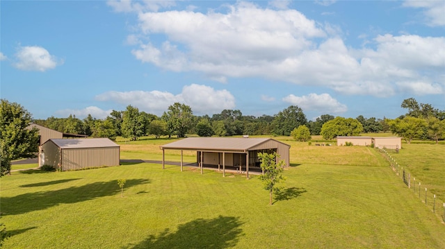 4555 Farm Rd Unit 1402, Mount Pleasant, TX 75455 - view of grassy yard with an outbuilding and an outdoor structure