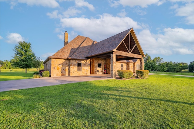 4555 Farm Rd Unit 1402, Mount Pleasant, TX 75455 - view of front of property featuring stone siding, a chimney, a front yard, and concrete driveway