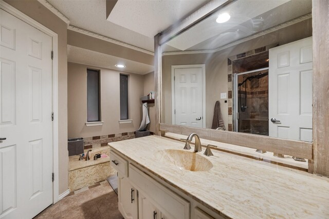 3302 Oxford Dr, Rowlett, TX 75088 - bathroom featuring vanity, a stall shower, tile patterned floors, a tub, and recessed lighting