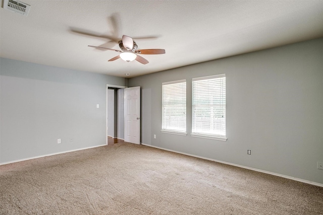 1347 Hillside Dr, Burleson, TX 76028 - carpeted empty room featuring a ceiling fan and baseboards