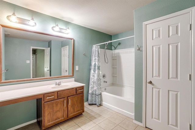 1347 Hillside Dr, Burleson, TX 76028 - bathroom with tile patterned floors, shower / bath combo with shower curtain, vanity, and a textured ceiling