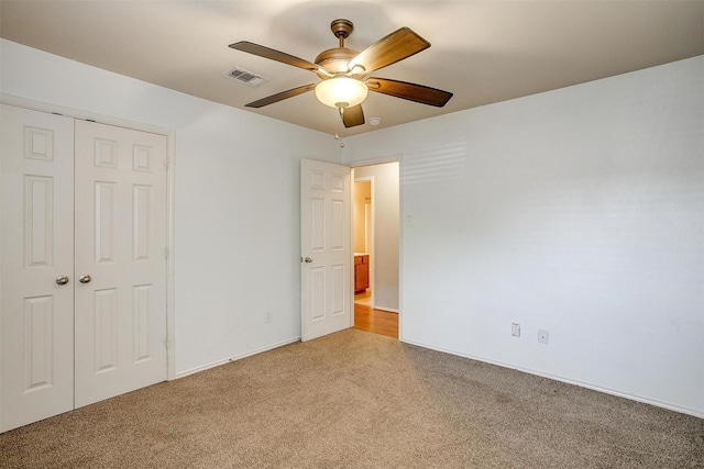 1347 Hillside Dr, Burleson, TX 76028 - unfurnished bedroom featuring carpet flooring, a closet, and ceiling fan