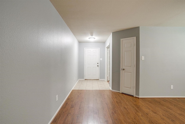 1347 Hillside Dr, Burleson, TX 76028 - corridor with wood finished floors and baseboards