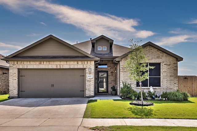9657 Alderleaf Trl, Fort Worth, TX 76036 - view of front of house with concrete driveway, a garage, brick siding, and roof with shingles