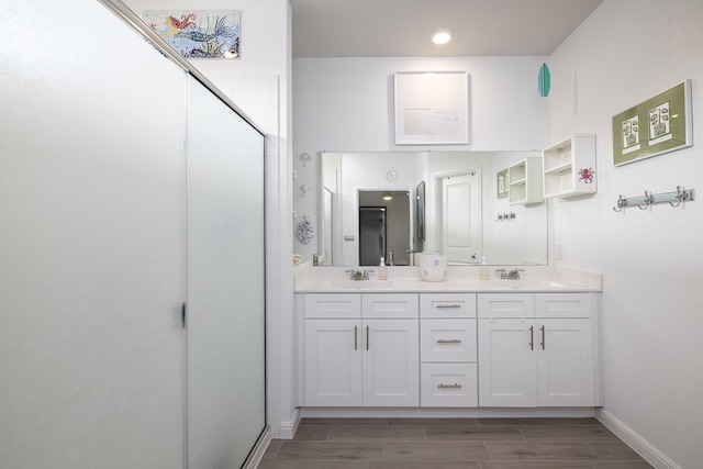 9657 Alderleaf Trl, Fort Worth, TX 76036 - full bath featuring a stall shower, double vanity, wood tiled floors, and recessed lighting