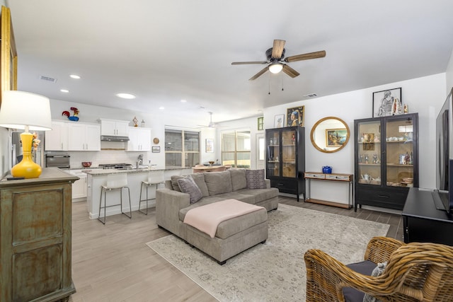 9657 Alderleaf Trl, Fort Worth, TX 76036 - living area featuring ceiling fan, light wood finished floors, and recessed lighting