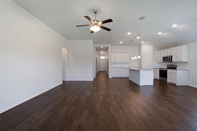 4205 Cordata Dr, Melissa, TX 75454 - unfurnished living room featuring a ceiling fan, dark wood finished floors, vaulted ceiling, and recessed lighting