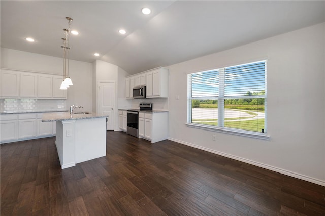 4205 Cordata Dr, Melissa, TX 75454 - kitchen featuring stainless steel appliances, white cabinets, dark wood finished floors, tasteful backsplash, and vaulted ceiling