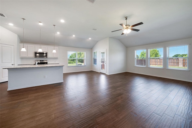 4205 Cordata Dr, Melissa, TX 75454 - unfurnished living room featuring lofted ceiling, ceiling fan, dark wood finished floors, and recessed lighting