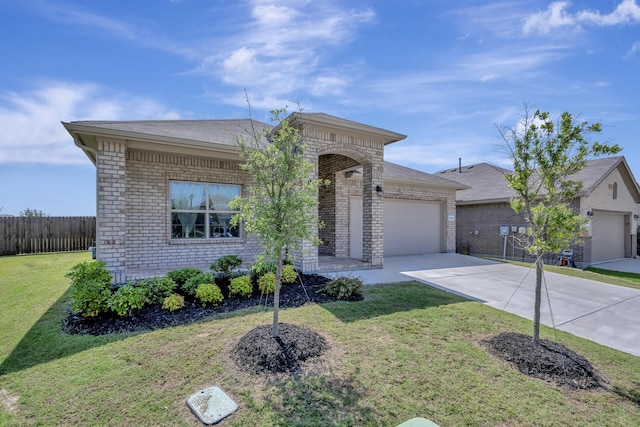 2305 Waggoner Ranch Dr, Weatherford, TX 76087 - view of front facade with brick siding, driveway, and a garage