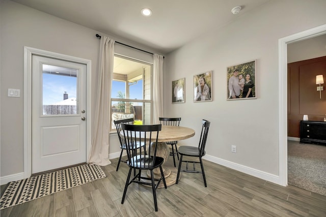 2305 Waggoner Ranch Dr, Weatherford, TX 76087 - dining space featuring wood finished floors and recessed lighting