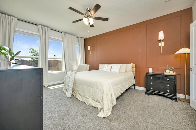 2305 Waggoner Ranch Dr, Weatherford, TX 76087 - bedroom featuring light carpet, a decorative wall, and a ceiling fan