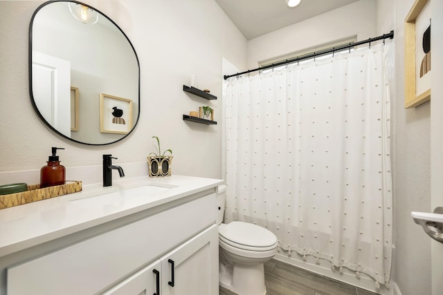 2305 Waggoner Ranch Dr, Weatherford, TX 76087 - bathroom with wood finished floors and vanity