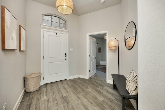 2305 Waggoner Ranch Dr, Weatherford, TX 76087 - entryway featuring wood finished floors and baseboards