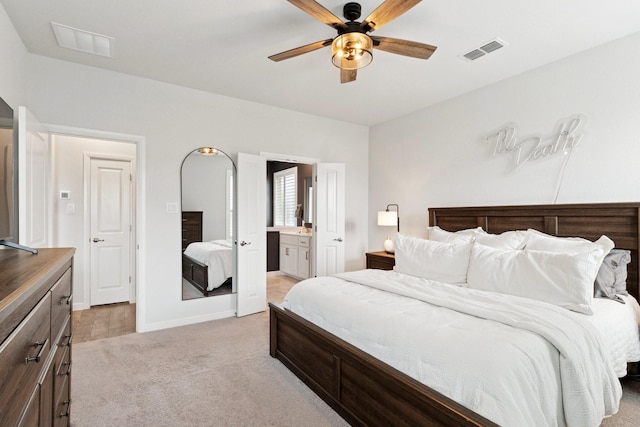 1000 Napier Way, Fort Worth, TX 76247 - bedroom featuring light carpet, connected bathroom, and a ceiling fan