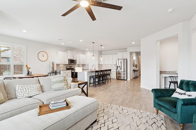1000 Napier Way, Fort Worth, TX 76247 - living room featuring ceiling fan, light wood-style flooring, and recessed lighting