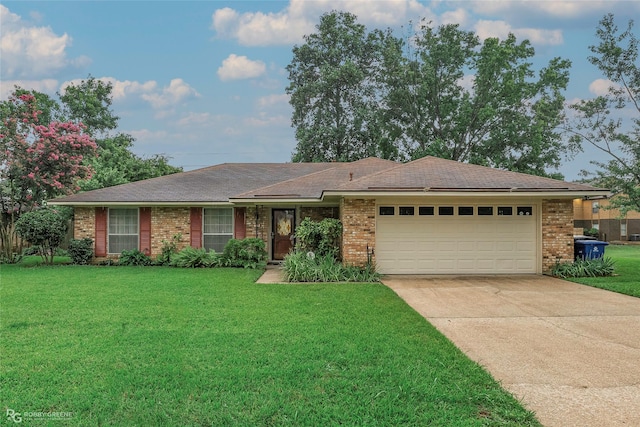 189 India Dr, Shreveport, LA 71115 - single story home featuring brick siding, a garage, driveway, a front yard, and roof with shingles